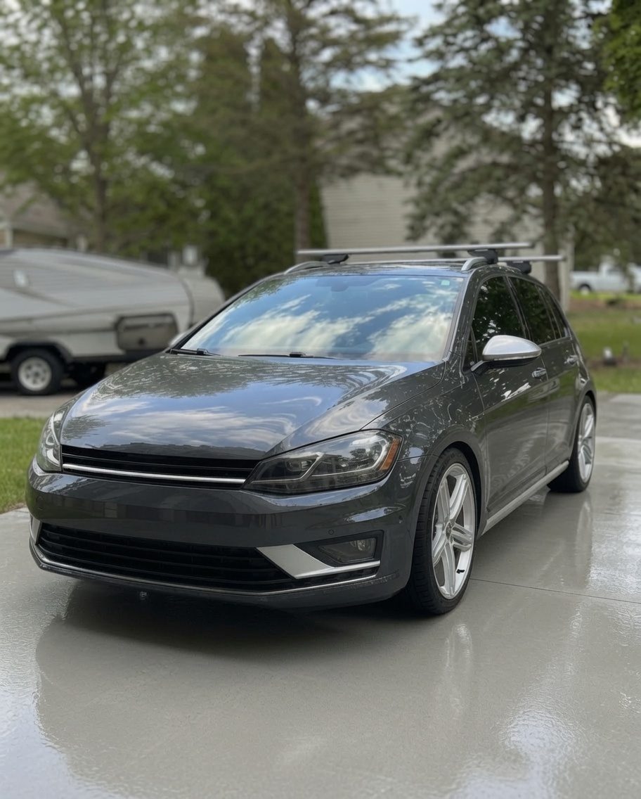 Grey Volkswagen Golf with a wet-look finish after hand washing and detailing