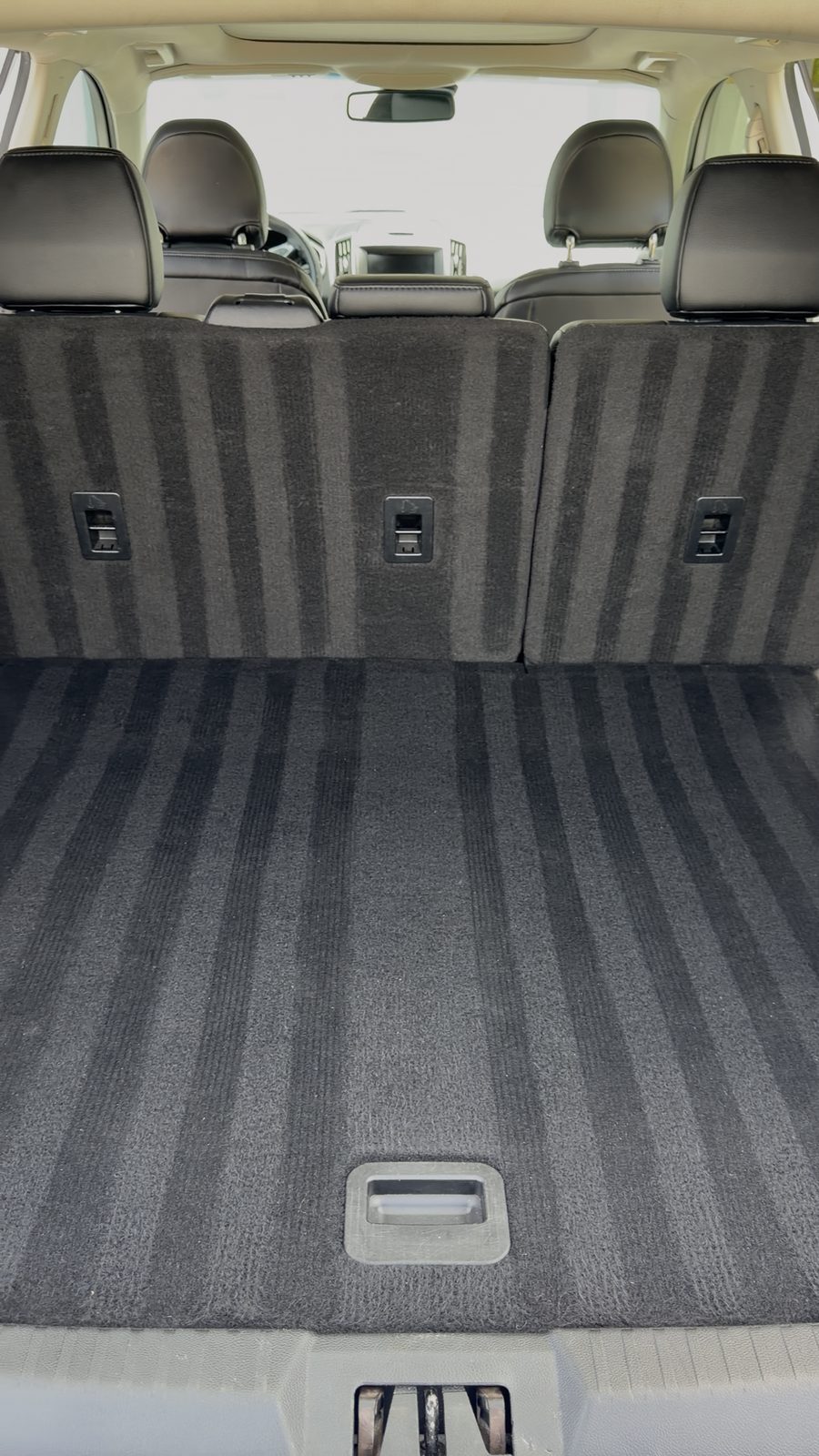 Spotless steam-cleaned cargo area and rear seats after an interior detail
